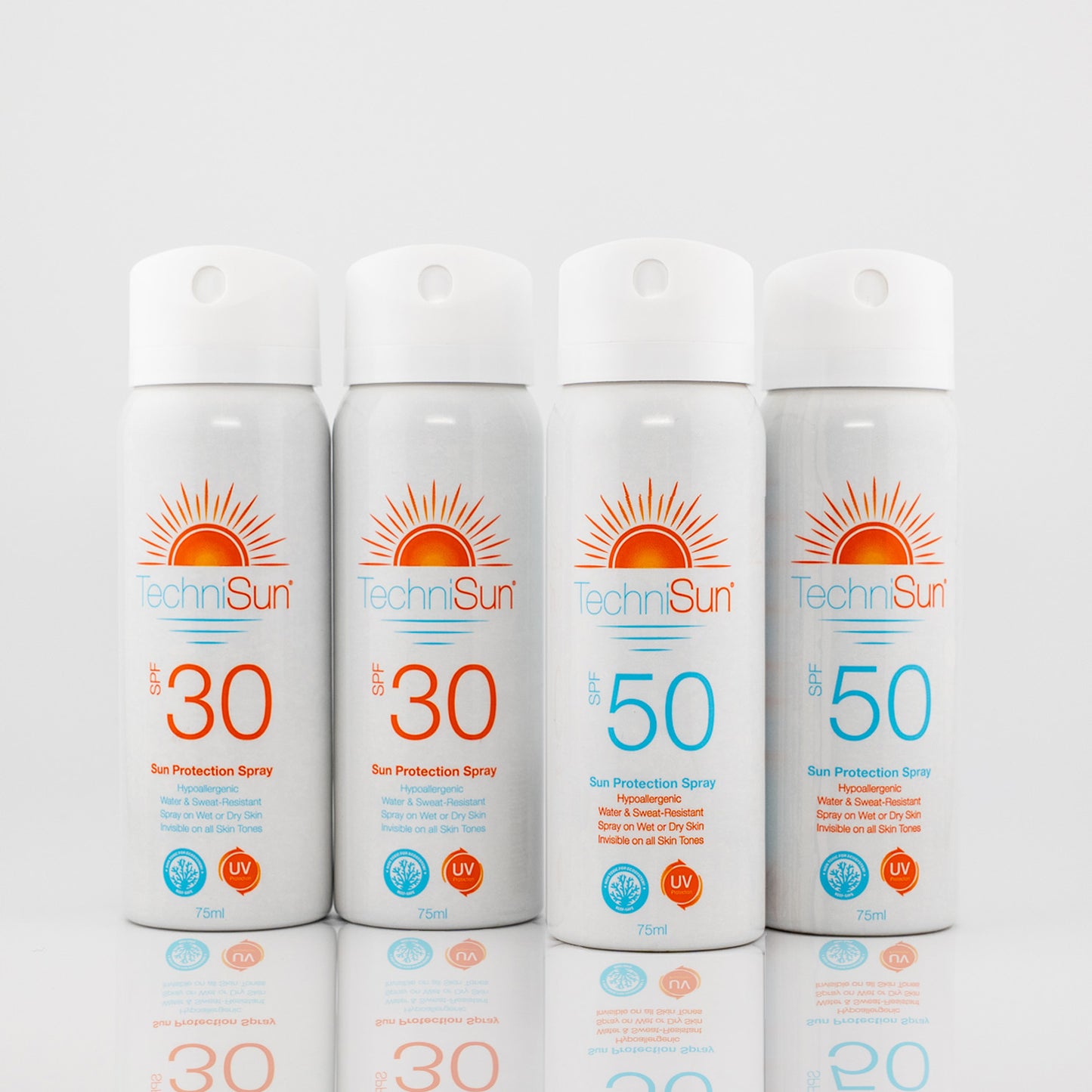 Four bottles of TechniSun sun protection spray with different SPF levels 